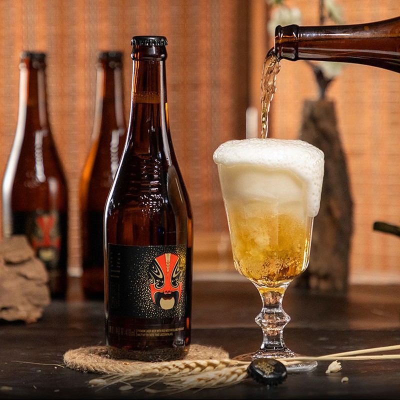 Premium Quality Snow Beer Opera Mask Series Bottle Packaging Lager Beer