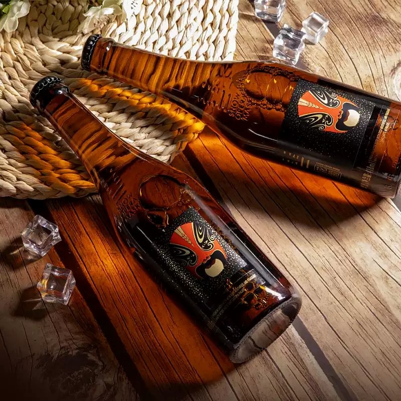 Premium Quality Snow Beer Opera Mask Series Bottle Packaging Lager Beer