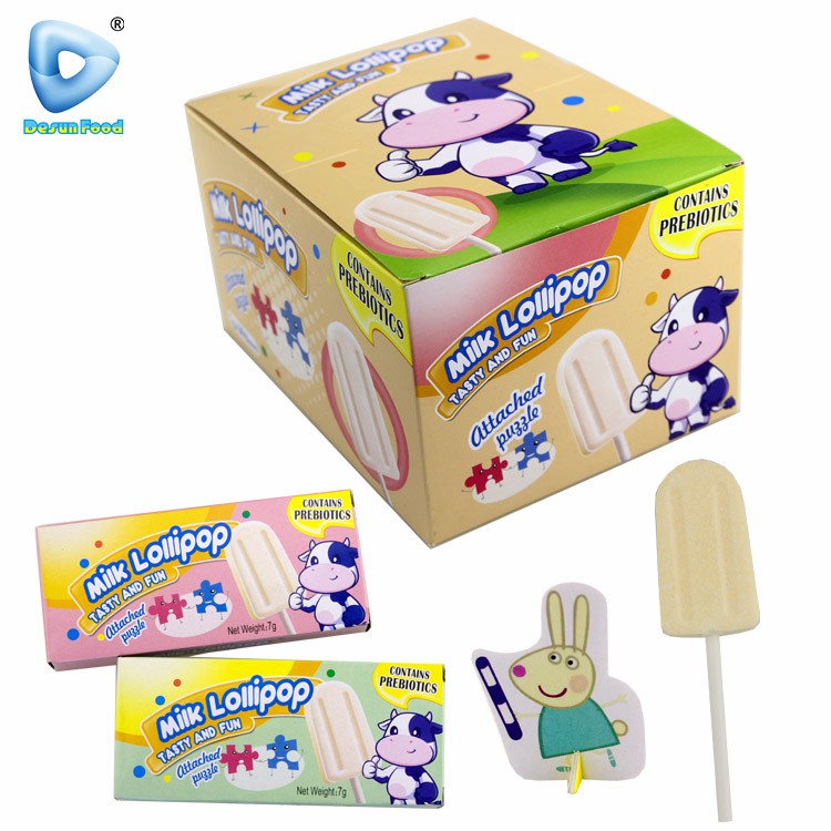 China Wholesale Delicious Chewy Milk Lollipop Pressed Candy with Cartoon Puzzle