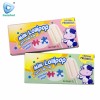 China Wholesale Delicious Chewy Milk Lollipop Pressed Candy with Cartoon Puzzle